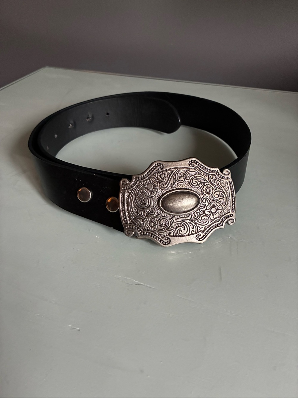 Black Leather Men’s Belt with Ornate Silver Buckle